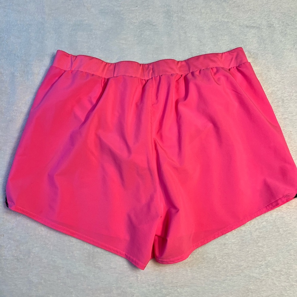 Under Armour Bright Pink Women’s Athletic Shorts with Black Trim - Picture 2 of 3